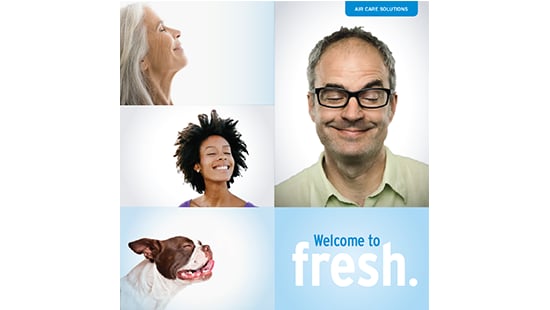 Front cover of Ecolab air care and large room air freshener product brochure showing satisfied people and pets.